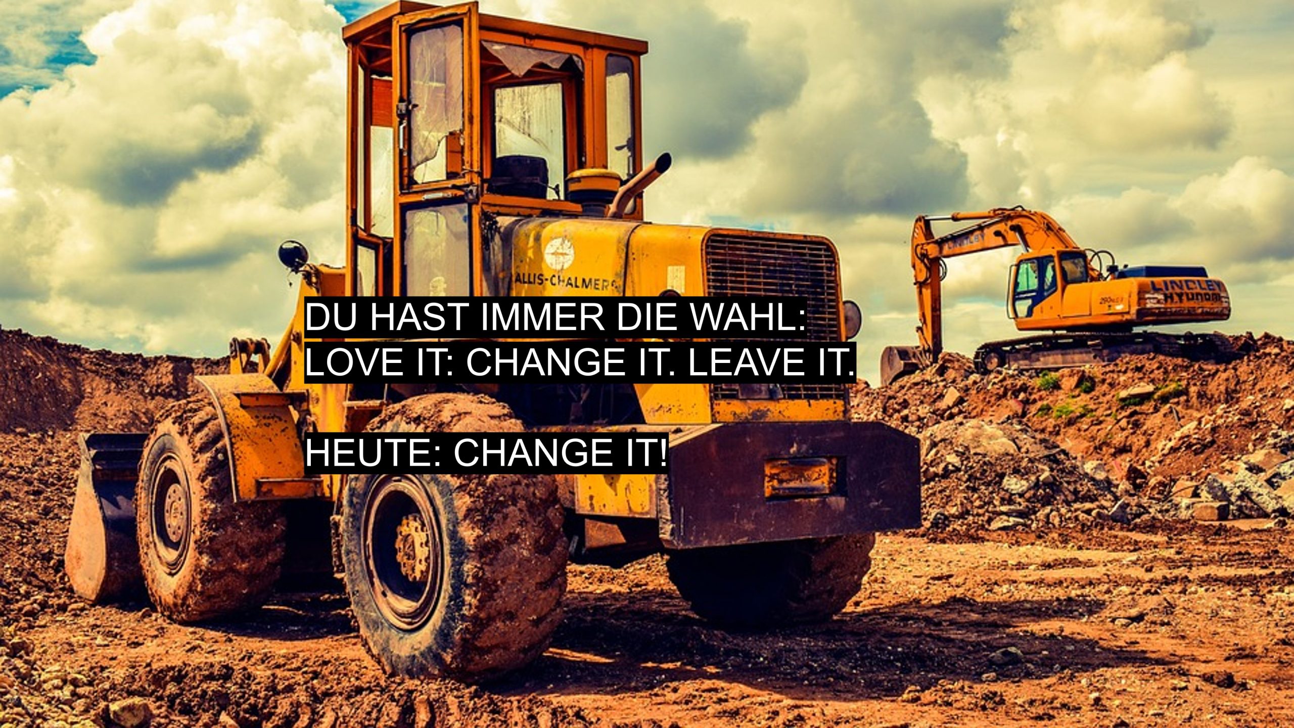Baustelle mit großem gelben Bagger – Symbol für Veränderung, Fortschritt und aktive Neugestaltung.
